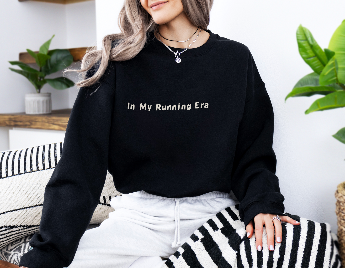 In My Running Era Sweatshirt on a model